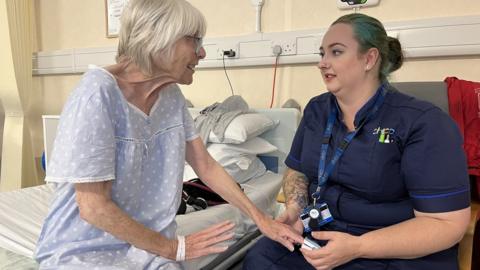 Yvonne Stone with a nurse