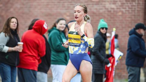 Calli Hauger-Thackery running at the Boston Marathon 