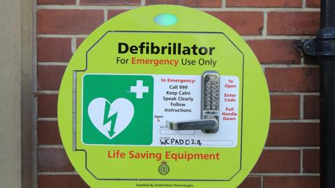 Defibrillator on a wall