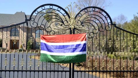 Gambian flag on the mansion's gates