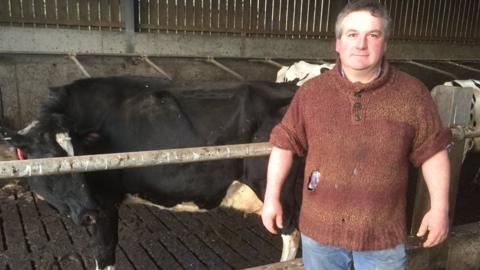 Keith Pugh with a cow