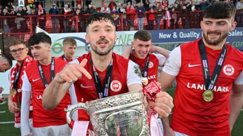 Tomas Cosgrove and Lee Bonis celebrate