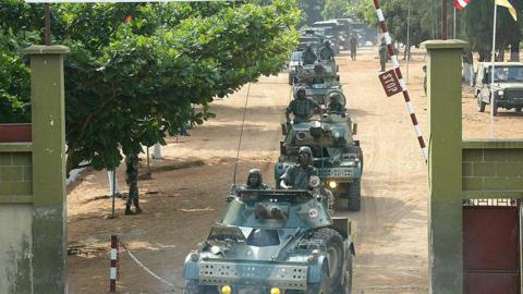 Benin's soldiers leave the Ouidah Military Camp to participate in the joint military exercise 05 December 2004 in Ouidah during a joint military exercise tagged 'RECAMP IV'. 