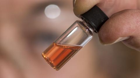 A vial of the ancient pink pigment