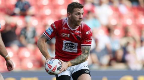 Salford Red Devil's Marc Sneyd in action