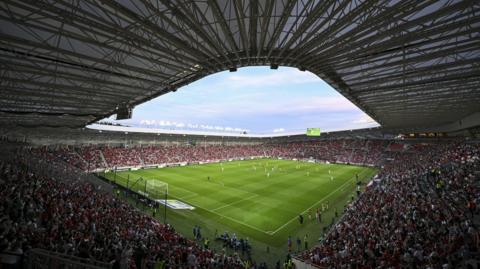 Fans inside the Nagyerdei Stadium in Debrecen watch Hungary v Kazakhstan