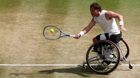 Alfie Hewett hits a forehand