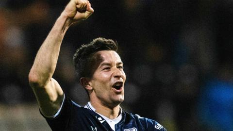 Dundee match winner Cammy Kerr celebrates