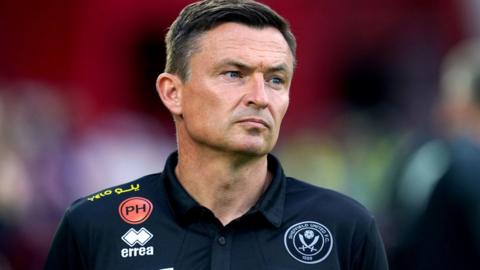 Paul Heckingbottom looks forlorn while coaching Sheffield United in the Premier League