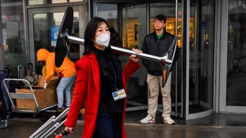 A delegate leaving COP26