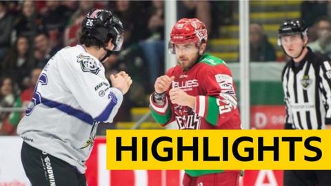 Riley Brandt of Cardiff Devils and Scott Simmonds of Manchester Storm drop the gloves in the Elite League