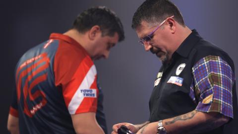 Gary Anderson and Mensur Suljovic