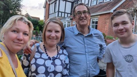 L-R Andrii's mother Liza, Gillian and Stuart Durrant and Andrii