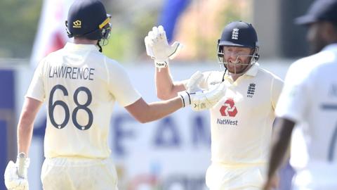 Dan Lawrence and Jonny Bairstow celebrate England's seven-wicket win