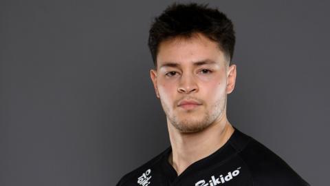 Jordan Williams stands for a pre-season press shot with London Broncos in 2024