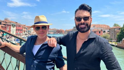 Rob Rinder and Rylan on a bridge in Venice