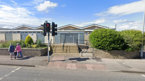 A single-story  library building with several roof apexes.