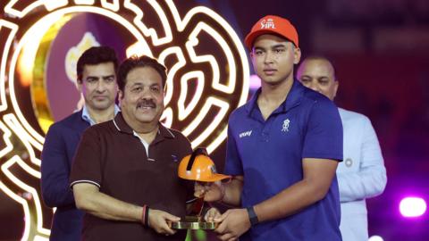 Vaibhav Sooryavanshi is handed the Orange Cap during the IPL final 