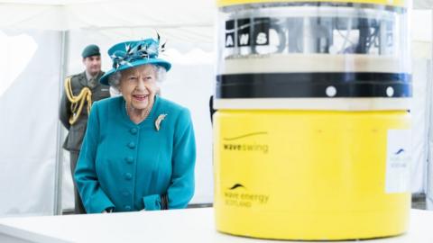 Queen Elizabeth is shown a wave energy converter model