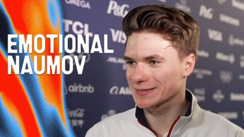 Maxim Naumov smiles in post skate interview