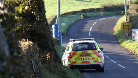 A police car at the scene on Saturday morning