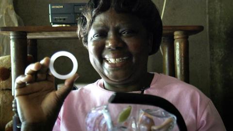 Local health worker Agnes with the ring that's helping women protect themselves from HIV