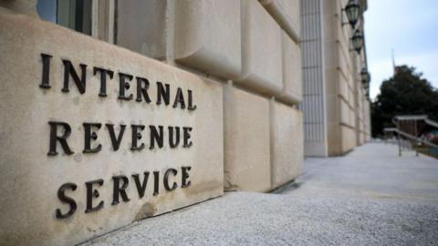 The IRS building in Washington, DC, featuring a wall with the words "Internal Revenue Service"