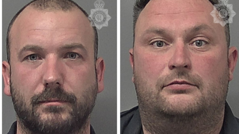 Police mugshot of Daniel Moss and David Brown. Moss has short dark hair and a beard. Brown has dark hair and stubble.