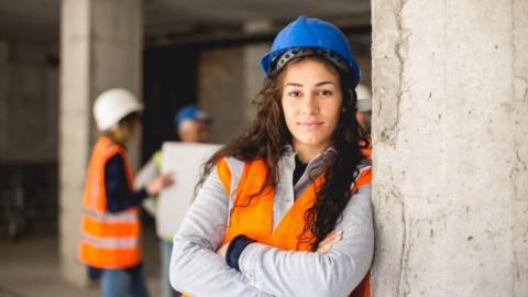 Woman working on construction site