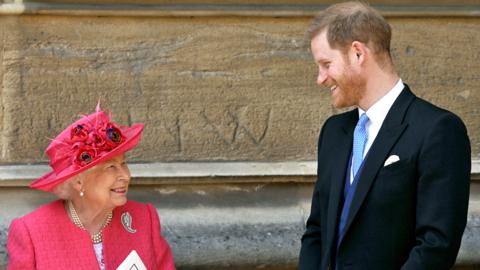 Queen Elizabeth II speaks with Prince Harry, Duke of Sussex as they leave after the wedding of Lady Gabriella Windsor to Thomas Kingston at St George's Chapel, Windsor Castle on May 18, 2019 in Windsor, England.