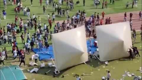Fans pulling down tents in Salt Lake stadium
