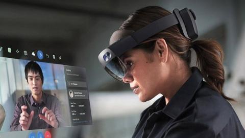 An engineer wearing a HoloLens 2 headset