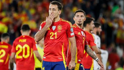 Mikel Oyarzabal blows a kiss to the fans as Spain celebrate