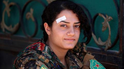 Female Kurdish fighter