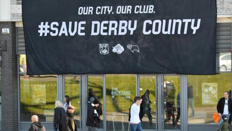 A banner outside of Derby County's Pride Park home ground