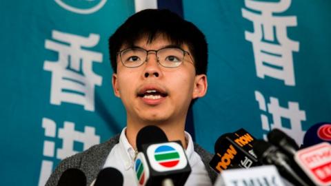 Pro-democracy activist Joshua Wong speaks to the media in front of the high court in Hong Kong on May 16, 2019, before judgement is handed down on his appeal of a three-month jail term received for contempt of court during the clearance of Mong Kok at the 2014 occupy protests.