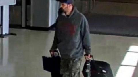 The suspect with bags