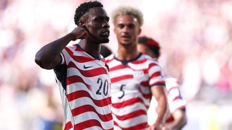 Balogun celebrates