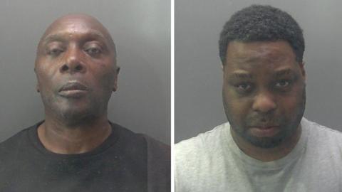 Malcolm Parker on the left. A man who is looking directly at the camera and is wearing a black sweatshirt. 
Junior Rankin on the right. A man wearing a light grey T-shirt who is looking directly at the camera.