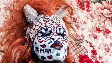 Someone dressed up in a traditional costume for Senegal’s famous Fake Lion Show at a cultural event at Ngor beach in Dakar – Wednesday 5 June 2024