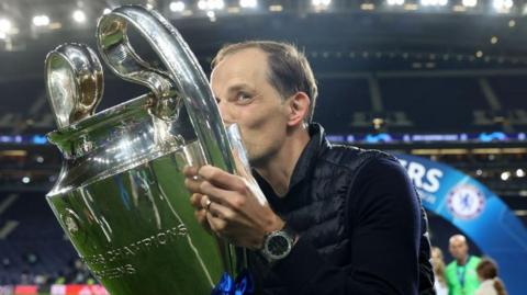 Thomas Tuchel kissing the Champions League trophy 