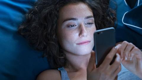 Woman scrolling on a phone