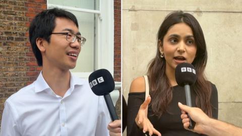 Two young people speaking into a BBC microphone while on the street.