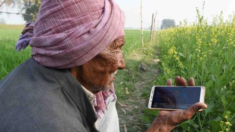 Farmer with phone