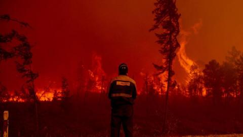 SAKHA, RUSSIA - AUGUST 8: Extinguishing works continue for the wildfire in the village of Kuel in Yakutia, Sakha, Russia on August 08, 2021. 