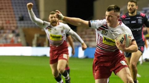 Wigan's Harry Smith scores a try