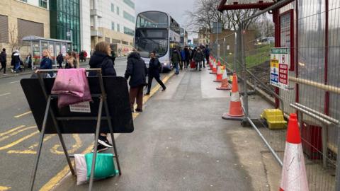 Passengers using the Nelson Street temporary bus station