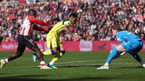 Brian Brobbey pushes Cristian Romero into Spurs team-mate Antonin Kinsky during the Premier League match between Sunderland and Tottenham Hotspur 