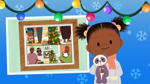JoJo holding her panda toy standing in front of gameplay of the CBeebies Grotto game.