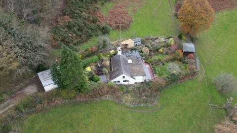 An aerial image of the remote home where bomb suspect Daniel Andreas San Diego lived